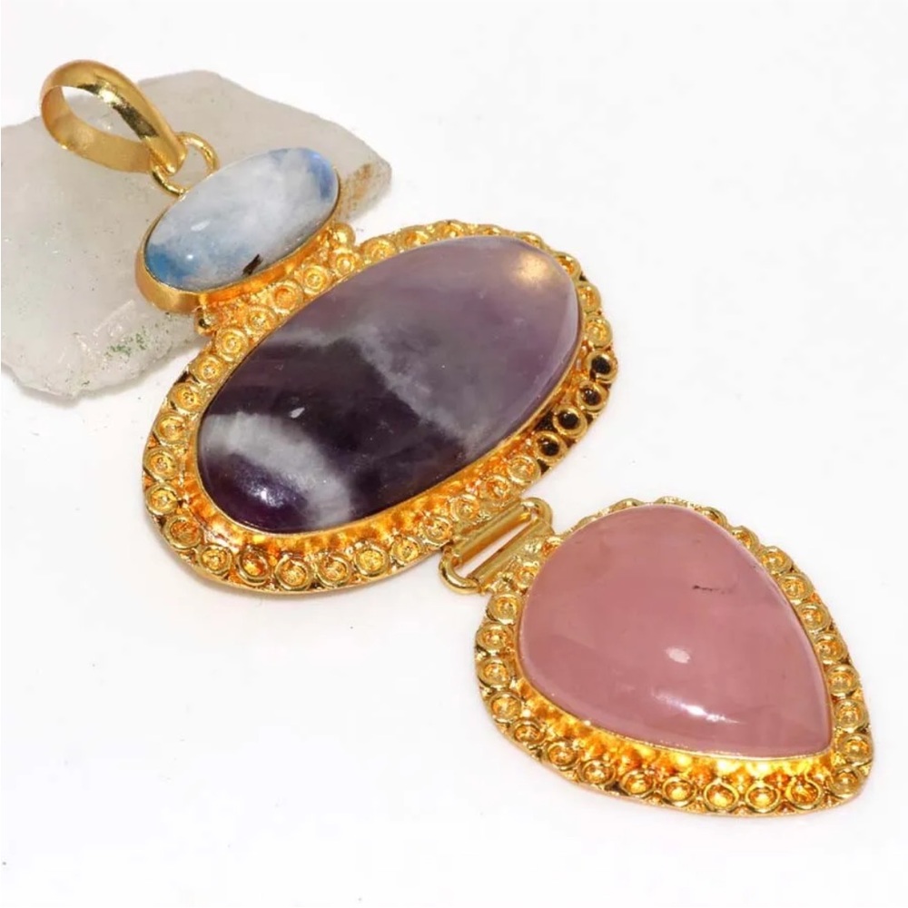 Rainbow moonstone, amethyst, and rose quartz, gold pendant